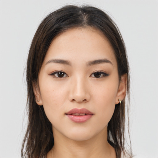 Neutral asian young-adult female with medium  brown hair and brown eyes