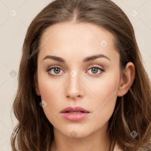 Neutral white young-adult female with long  brown hair and brown eyes