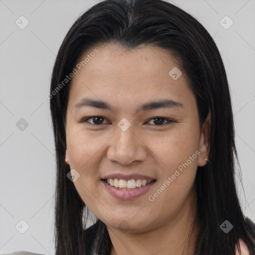 Joyful asian young-adult female with long  brown hair and brown eyes