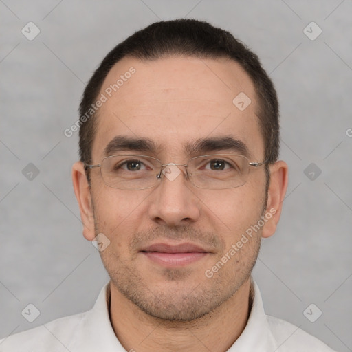 Joyful white adult male with short  brown hair and brown eyes