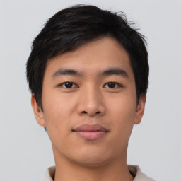 Neutral asian young-adult male with short  brown hair and brown eyes