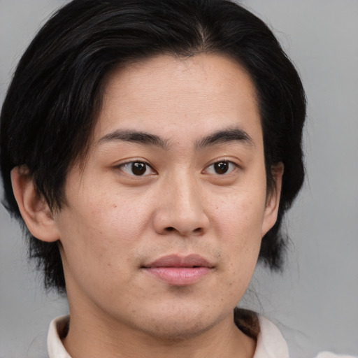 Neutral asian young-adult female with medium  brown hair and brown eyes