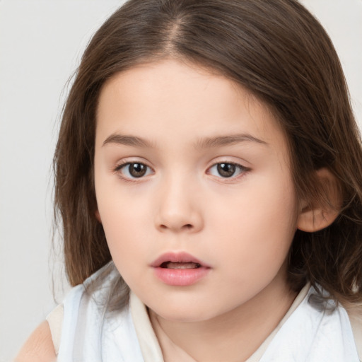 Neutral white child female with medium  brown hair and brown eyes