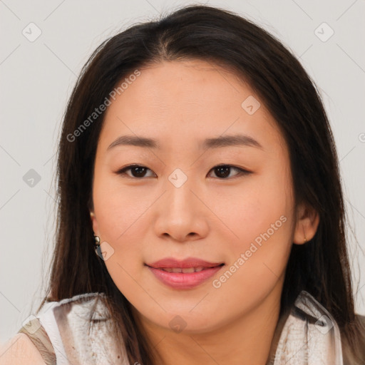 Joyful asian young-adult female with long  brown hair and brown eyes