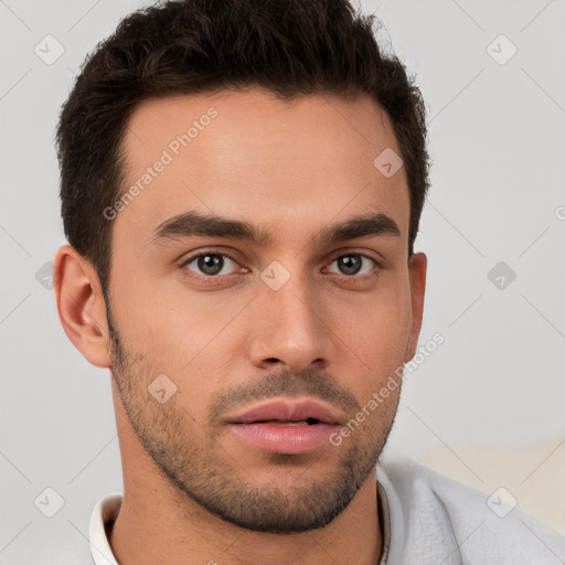 Neutral white young-adult male with short  brown hair and brown eyes