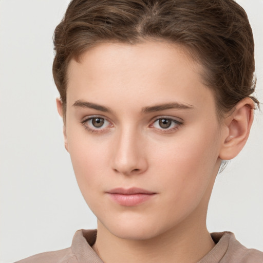 Neutral white young-adult female with short  brown hair and brown eyes