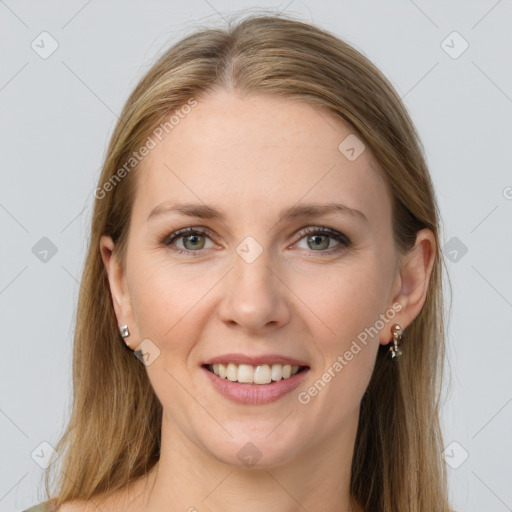 Joyful white young-adult female with long  brown hair and grey eyes