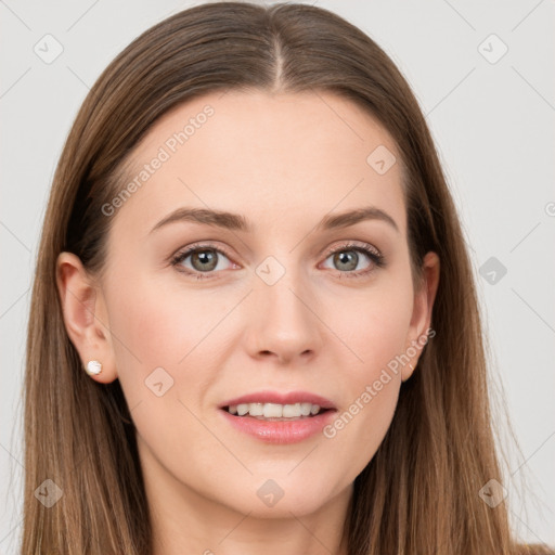 Joyful white young-adult female with long  brown hair and grey eyes