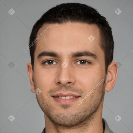 Joyful white young-adult male with short  brown hair and brown eyes