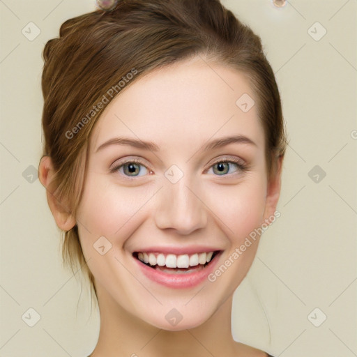 Joyful white young-adult female with medium  brown hair and green eyes