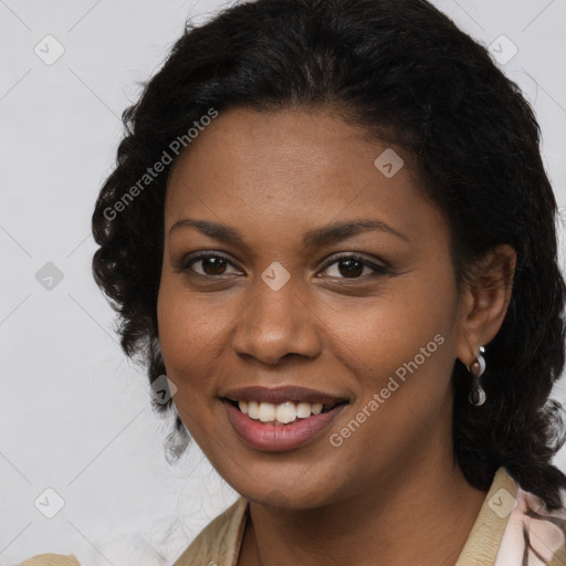 Joyful black young-adult female with long  brown hair and brown eyes