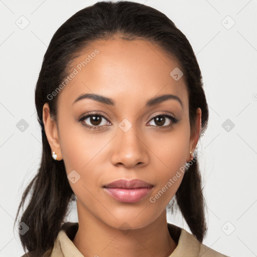 Joyful latino young-adult female with long  brown hair and brown eyes