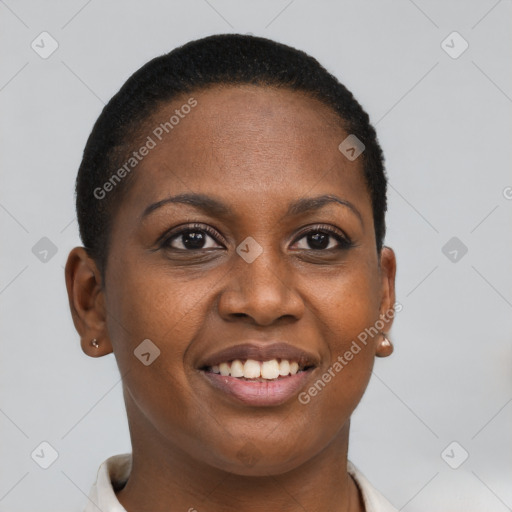 Joyful black young-adult female with short  brown hair and brown eyes