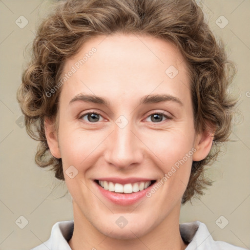 Joyful white young-adult female with medium  brown hair and green eyes