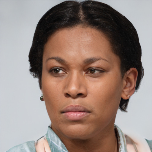 Neutral black young-adult female with short  brown hair and brown eyes