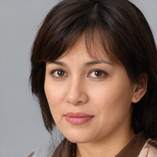 Neutral white adult female with medium  brown hair and brown eyes