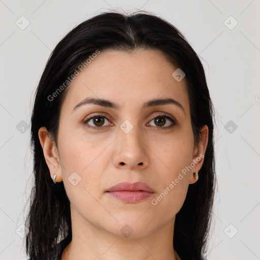 Joyful asian young-adult female with long  brown hair and brown eyes