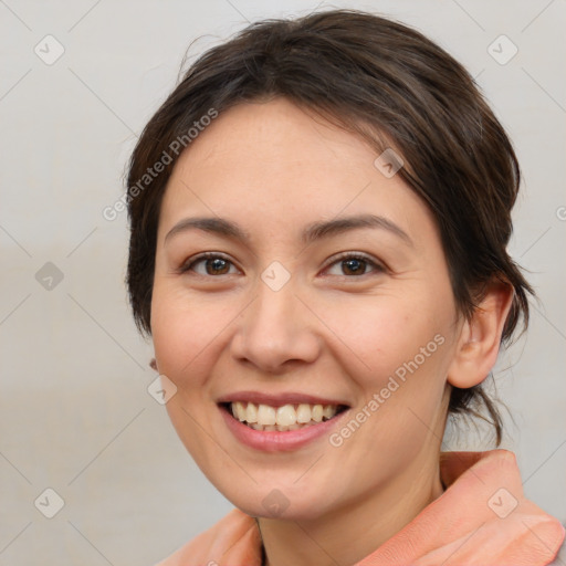 Joyful white young-adult female with medium  brown hair and brown eyes