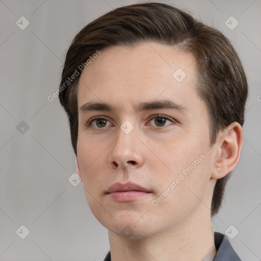 Neutral white young-adult male with short  brown hair and brown eyes