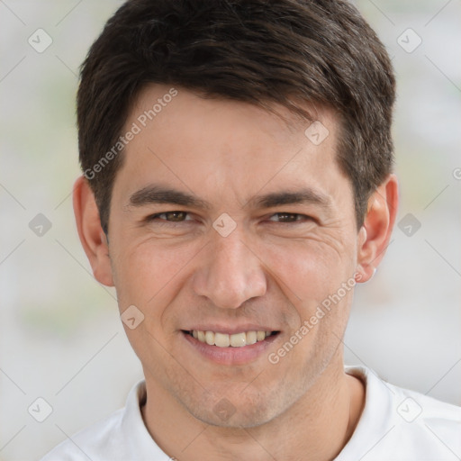 Joyful white adult male with short  brown hair and brown eyes