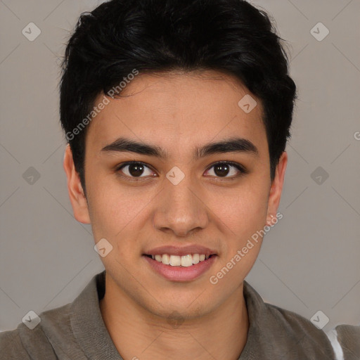 Joyful latino young-adult male with short  brown hair and brown eyes