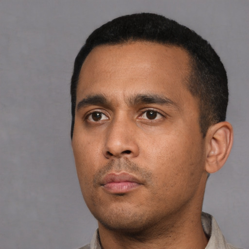 Neutral black young-adult male with short  black hair and brown eyes