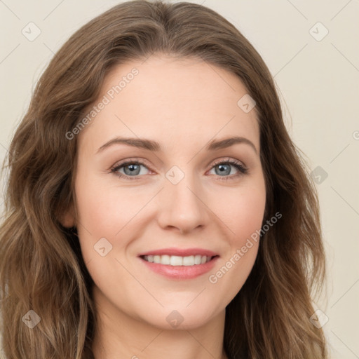 Joyful white young-adult female with long  brown hair and green eyes