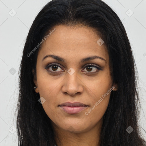 Joyful latino young-adult female with long  brown hair and brown eyes