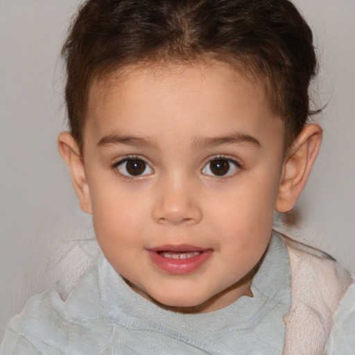 Joyful white child female with short  brown hair and brown eyes