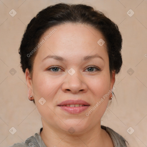 Joyful white adult female with short  brown hair and brown eyes