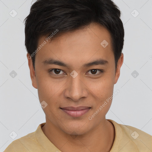 Joyful asian young-adult male with short  brown hair and brown eyes