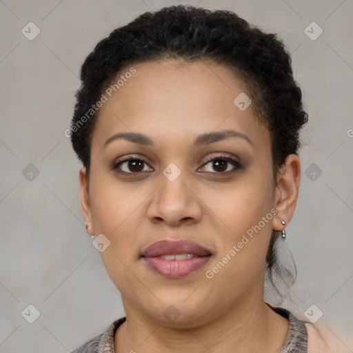 Joyful black young-adult female with short  brown hair and brown eyes