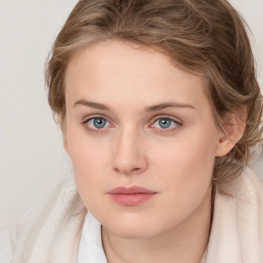 Neutral white young-adult female with medium  brown hair and blue eyes