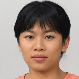 Neutral asian young-adult female with medium  brown hair and brown eyes