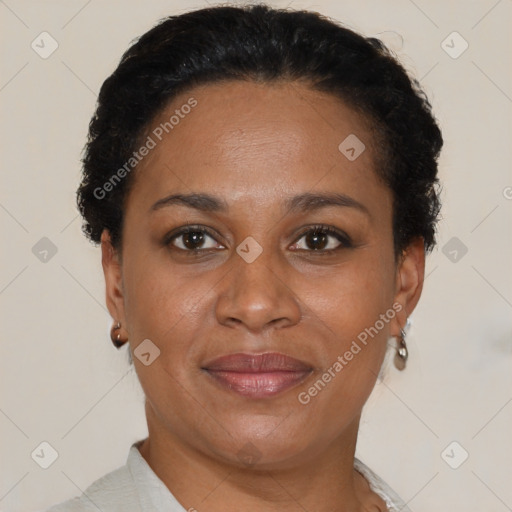 Joyful black adult female with short  brown hair and brown eyes