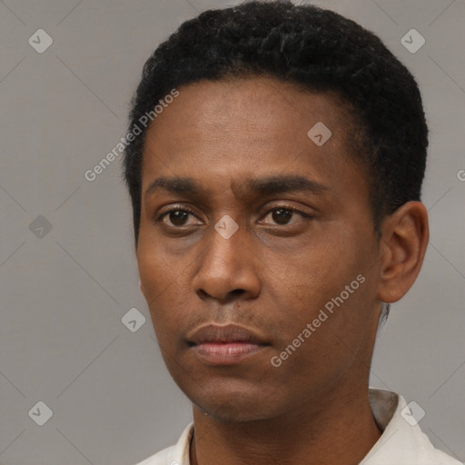 Neutral black young-adult male with short  black hair and brown eyes