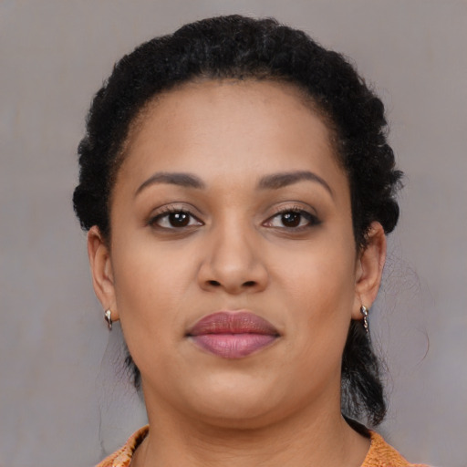 Neutral black young-adult female with short  brown hair and brown eyes