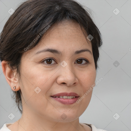 Joyful white adult female with medium  brown hair and brown eyes