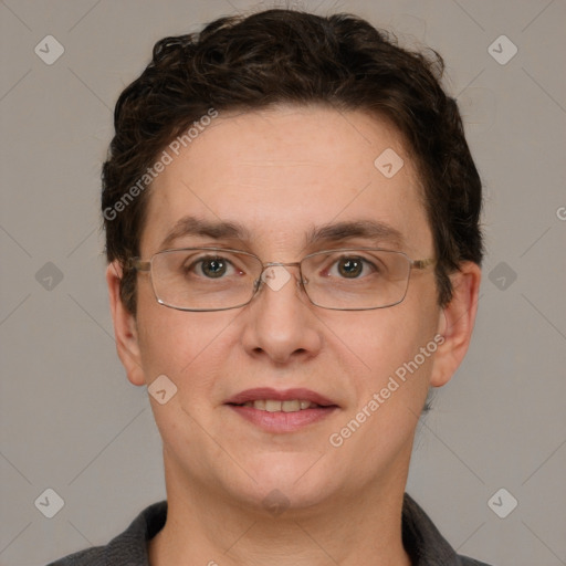 Joyful white adult male with short  brown hair and grey eyes