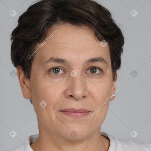 Joyful white adult female with short  brown hair and brown eyes