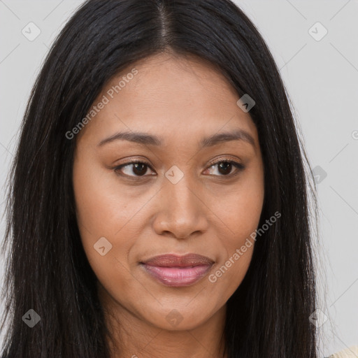 Joyful asian young-adult female with long  brown hair and brown eyes