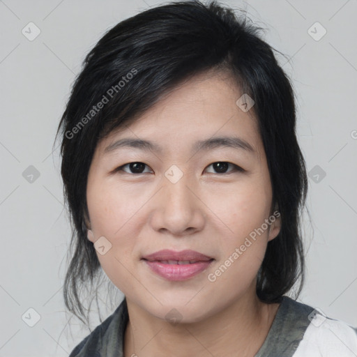 Joyful white young-adult female with medium  black hair and brown eyes