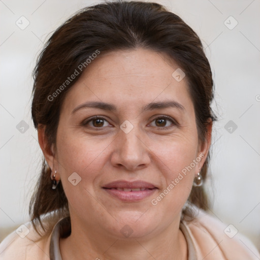 Joyful white adult female with medium  brown hair and brown eyes