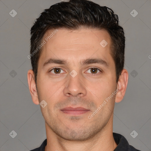 Joyful white adult male with short  brown hair and brown eyes