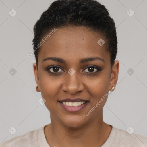 Joyful black young-adult female with short  black hair and brown eyes