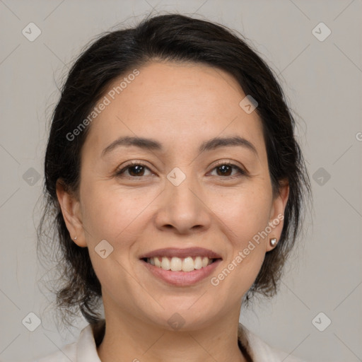 Joyful white adult female with medium  brown hair and brown eyes