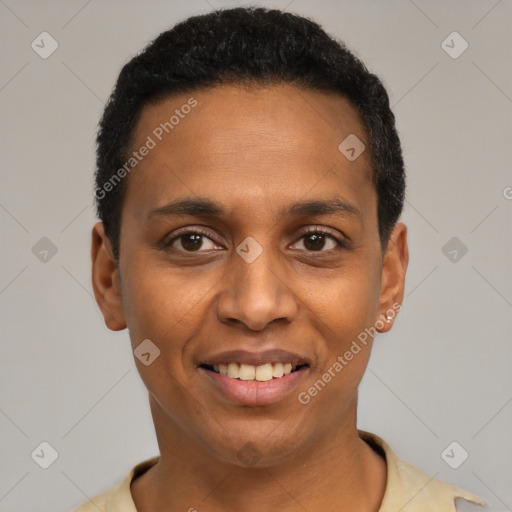 Joyful latino young-adult male with short  black hair and brown eyes