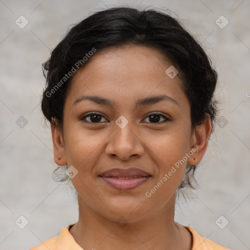 Joyful latino young-adult female with short  brown hair and brown eyes