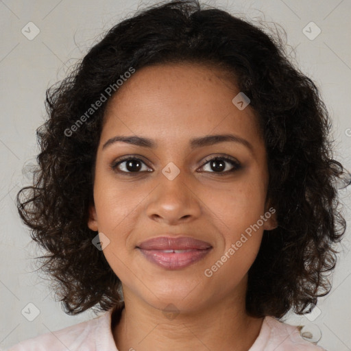 Joyful black young-adult female with medium  brown hair and brown eyes