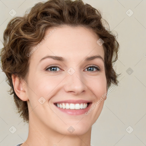 Joyful white young-adult female with medium  brown hair and green eyes